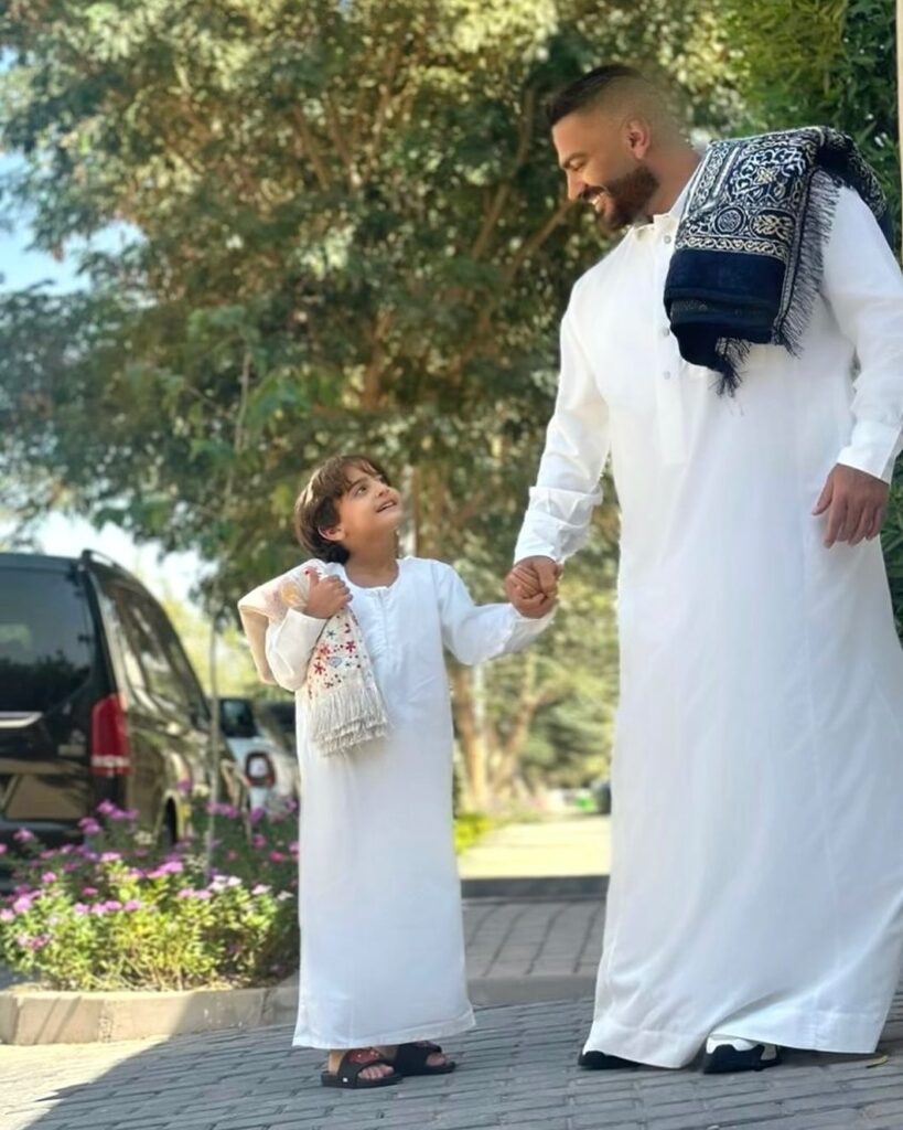 تامر حسني ونجله آدم